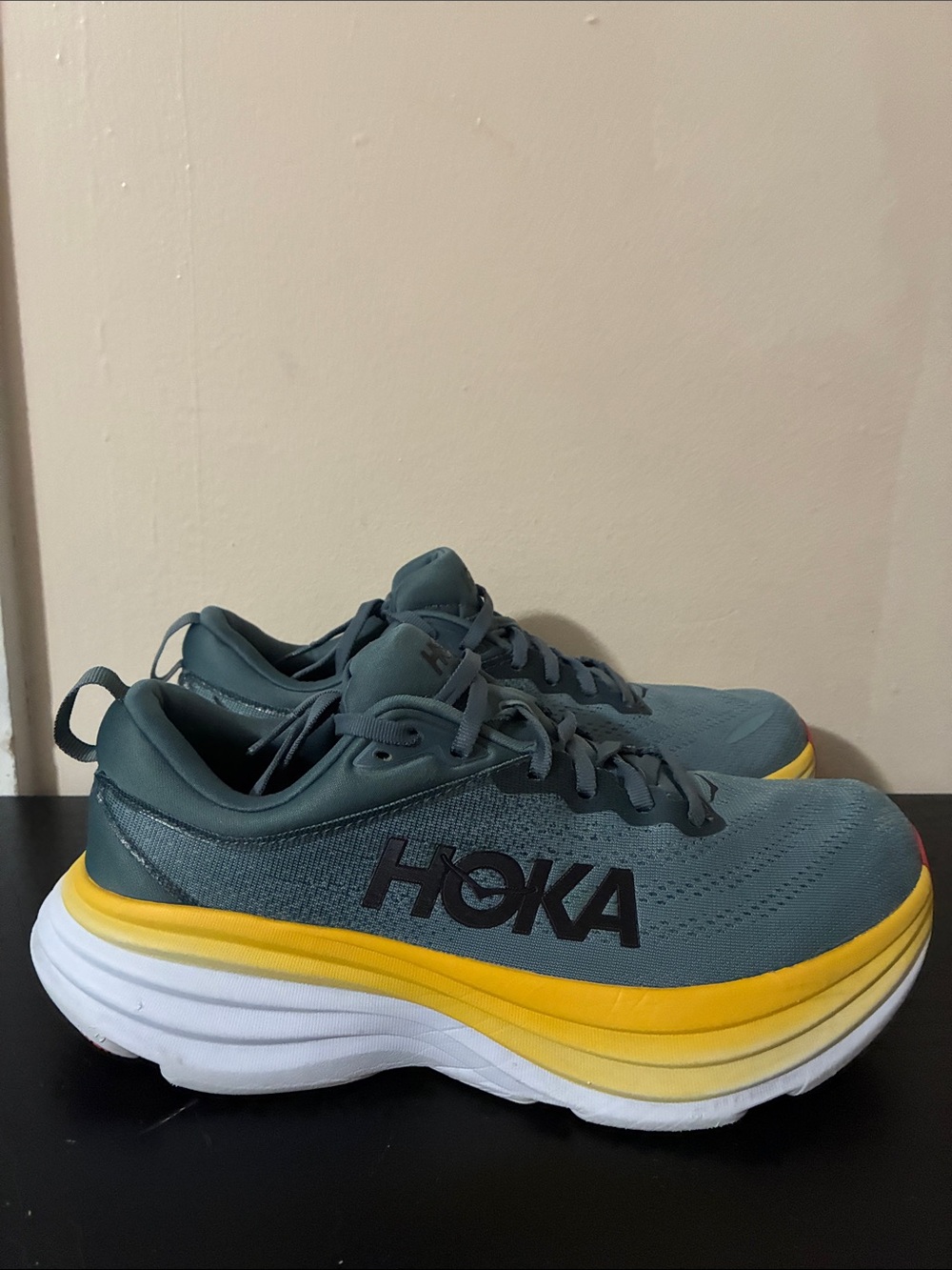 Hoka Bondi 8 running shoes in the Goblin Blue and Mountain Spring color size 9.5